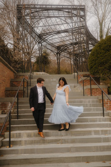 Couple having fun at Conservatory Garden Central Park engagement photos romantic NYC photographer