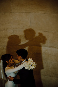 Romantic shadow portrait of newlyweds inside Brooklyn City Hall, artistic Brooklyn elopement photography