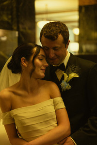 handwritten courthouse wedding vows on folded paper with wedding rings