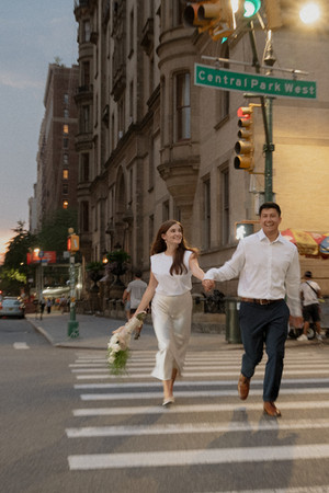 couple during a professionally planned marriage proposal in Central Park