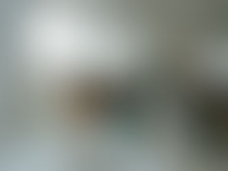 Intimate NYC wedding ceremony with bride and groom first kiss at Atmosfera Astoria, guests applaud in a stylish micro wedding setting