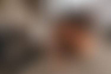 Couple holds hands in NYC during engagement photoshoot in New York City