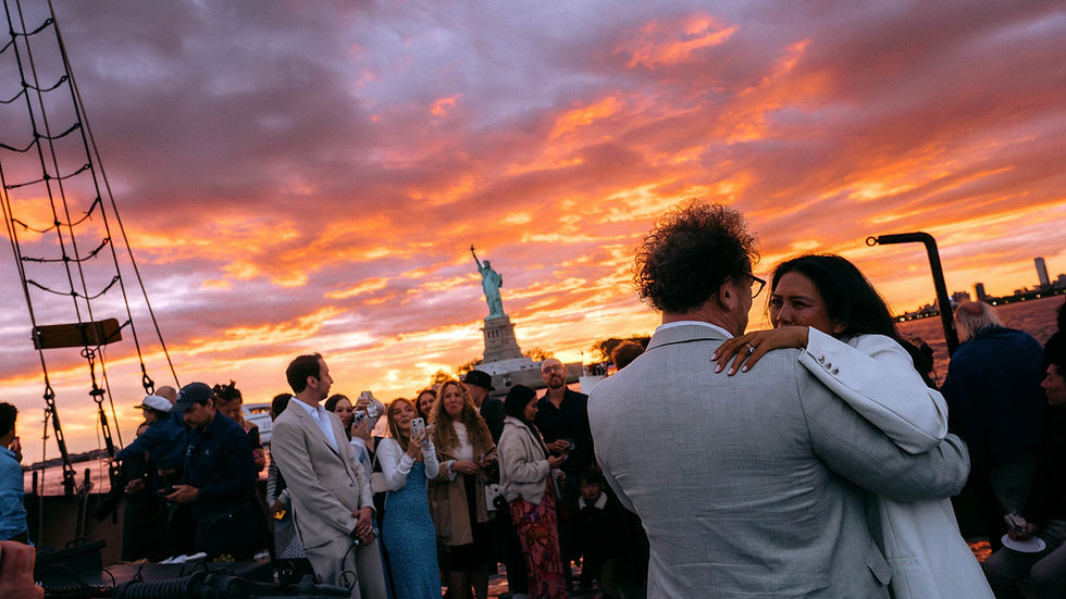 East River sunset sail wedding with the Statue of Liberty and NYC skyline