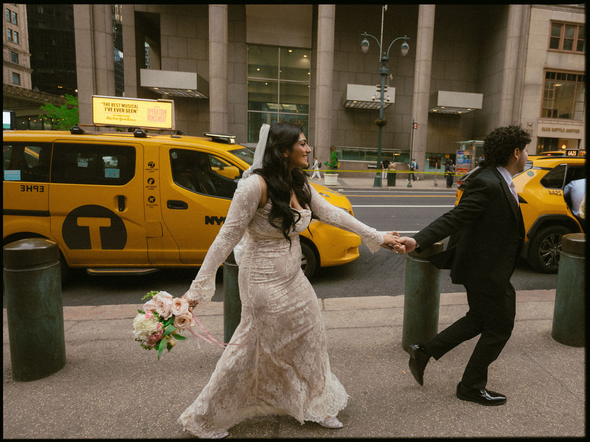 documentary wedding photo bride in lace dress running across street with yellow taxi cab foley square nyc elopement