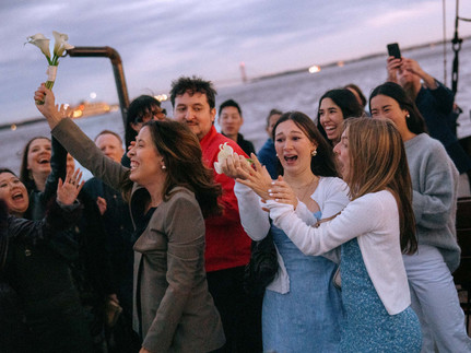NYC boat wedding reception dancing into the night on the East River cinematic photographer NYC