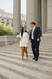Manhattan City Hall wedding portraits on the courthouse steps and columns