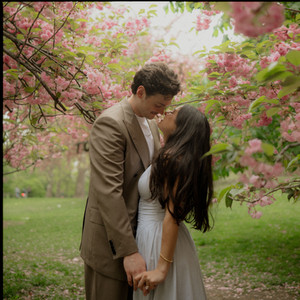 Cherry blossom engagement photos Central Park New York cinematic photography romantic engagement session
