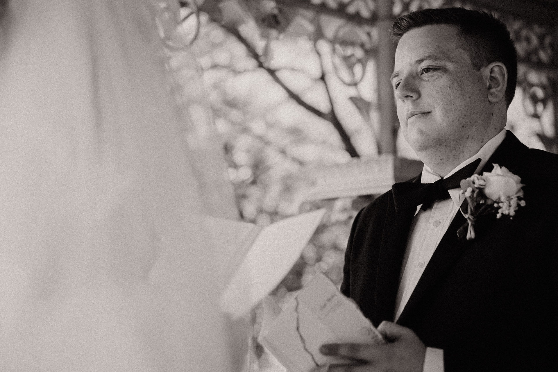 Central Park elopement, bride reading vows from book, springtime New York elopement photography