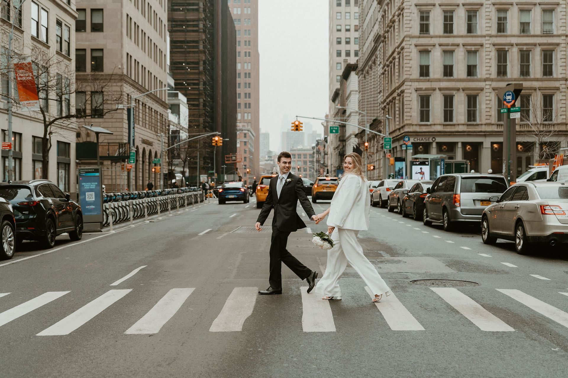 cinematic couple crosswalk portrait new york city elopement photographer