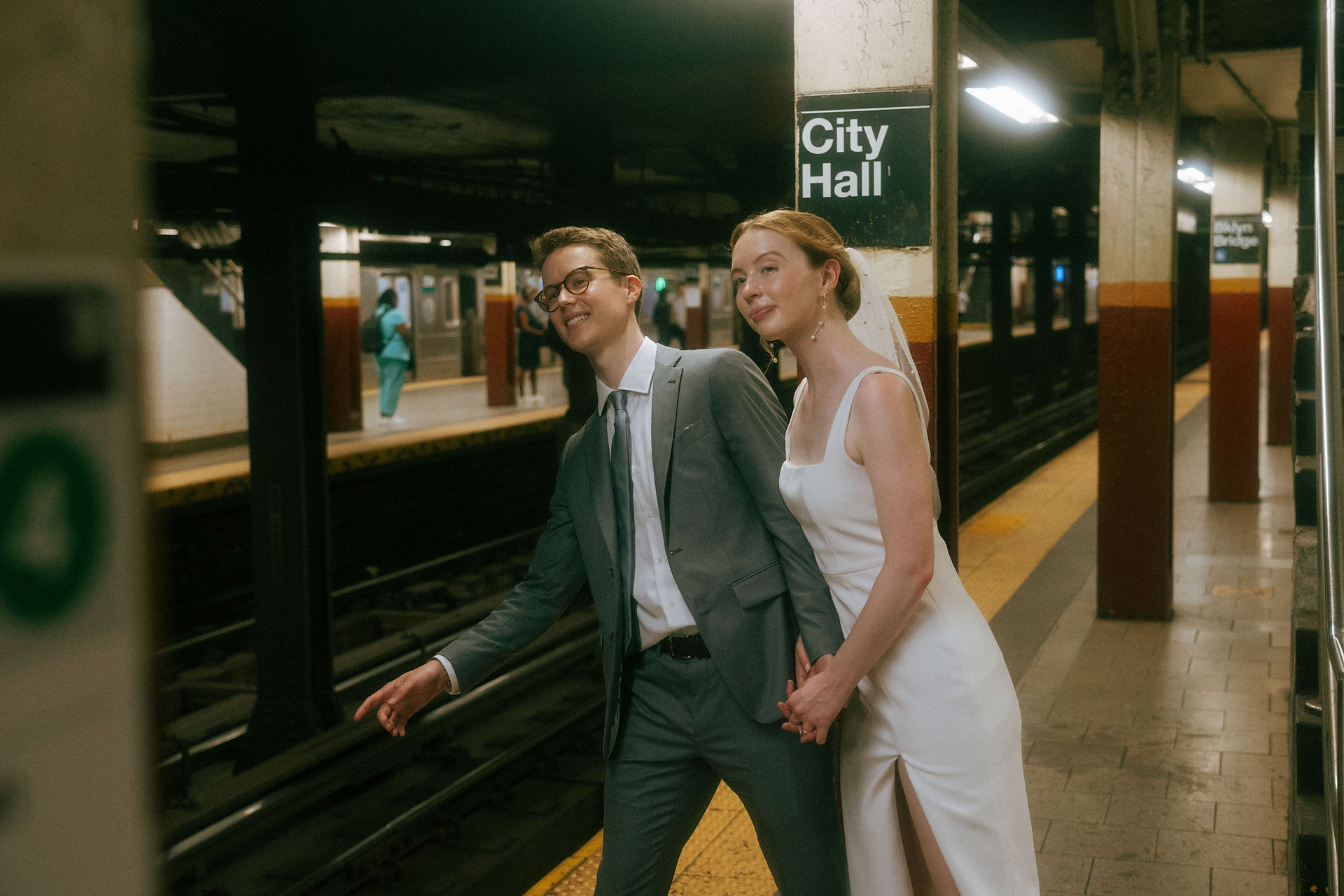 nyc subway wedding photos candid elopement bride groom platform