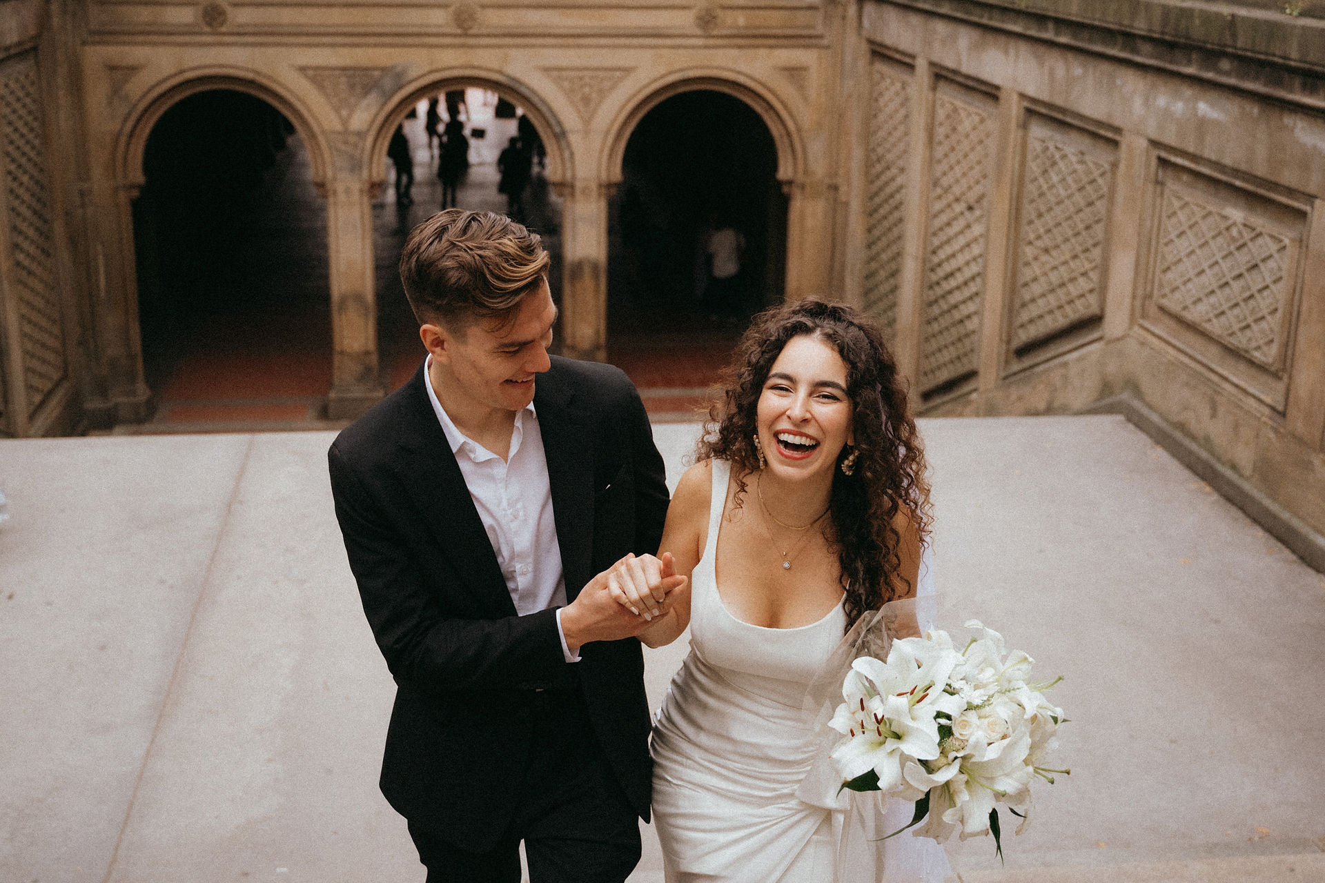 candid bride laughing bethesda arcade central park wedding photography