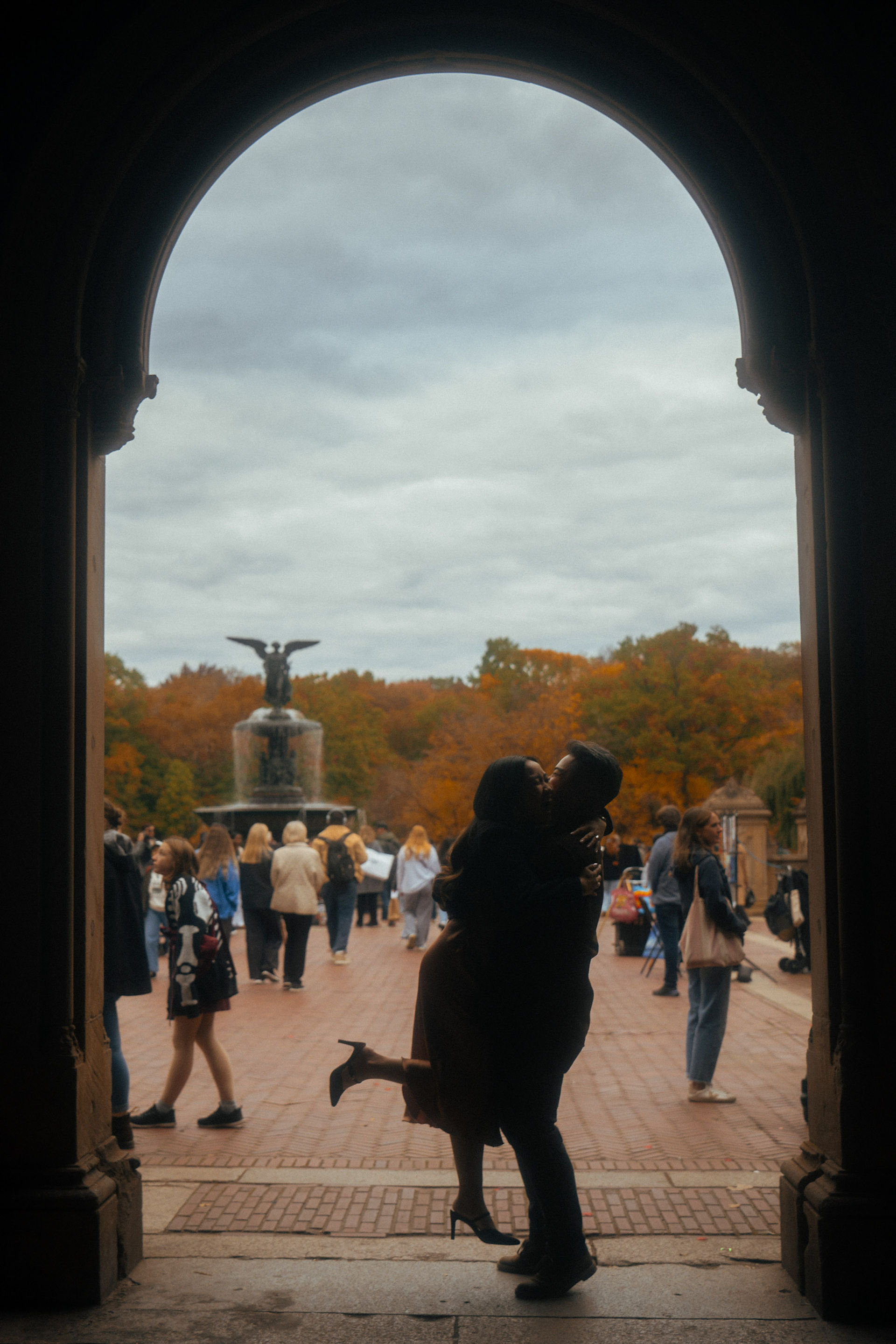 surprise proposal under peak fall foliage at Bethesda Terrace