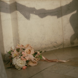 film wedding photography bridal bouquet soft light analog grain detail shot