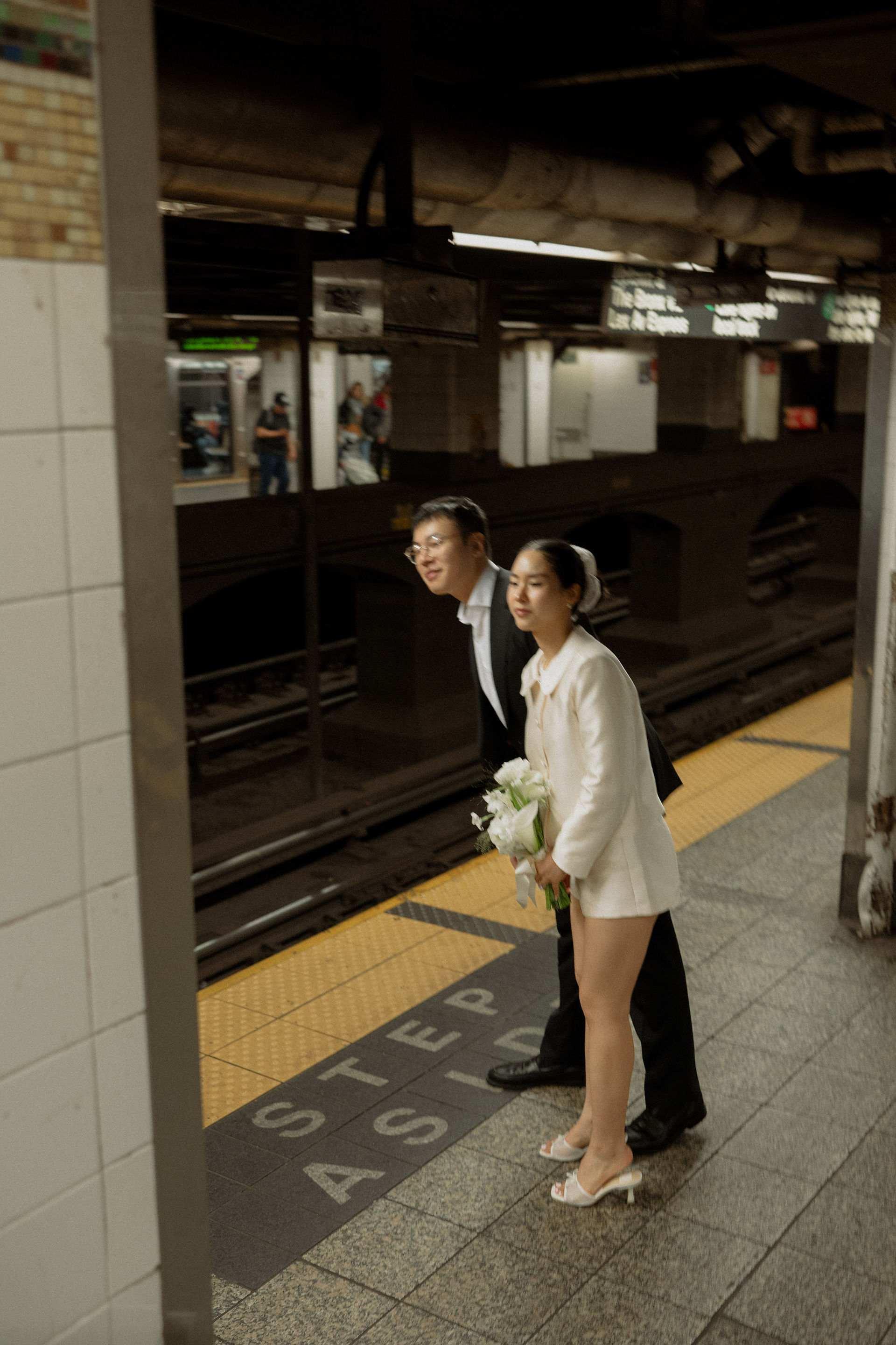 city hall nyc wedding photos, couple subway New York, dreamy cinematic romcom photos