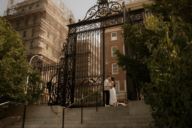 Couple at Conservatory Garden Central Park engagement photos NYC cinematic photographer