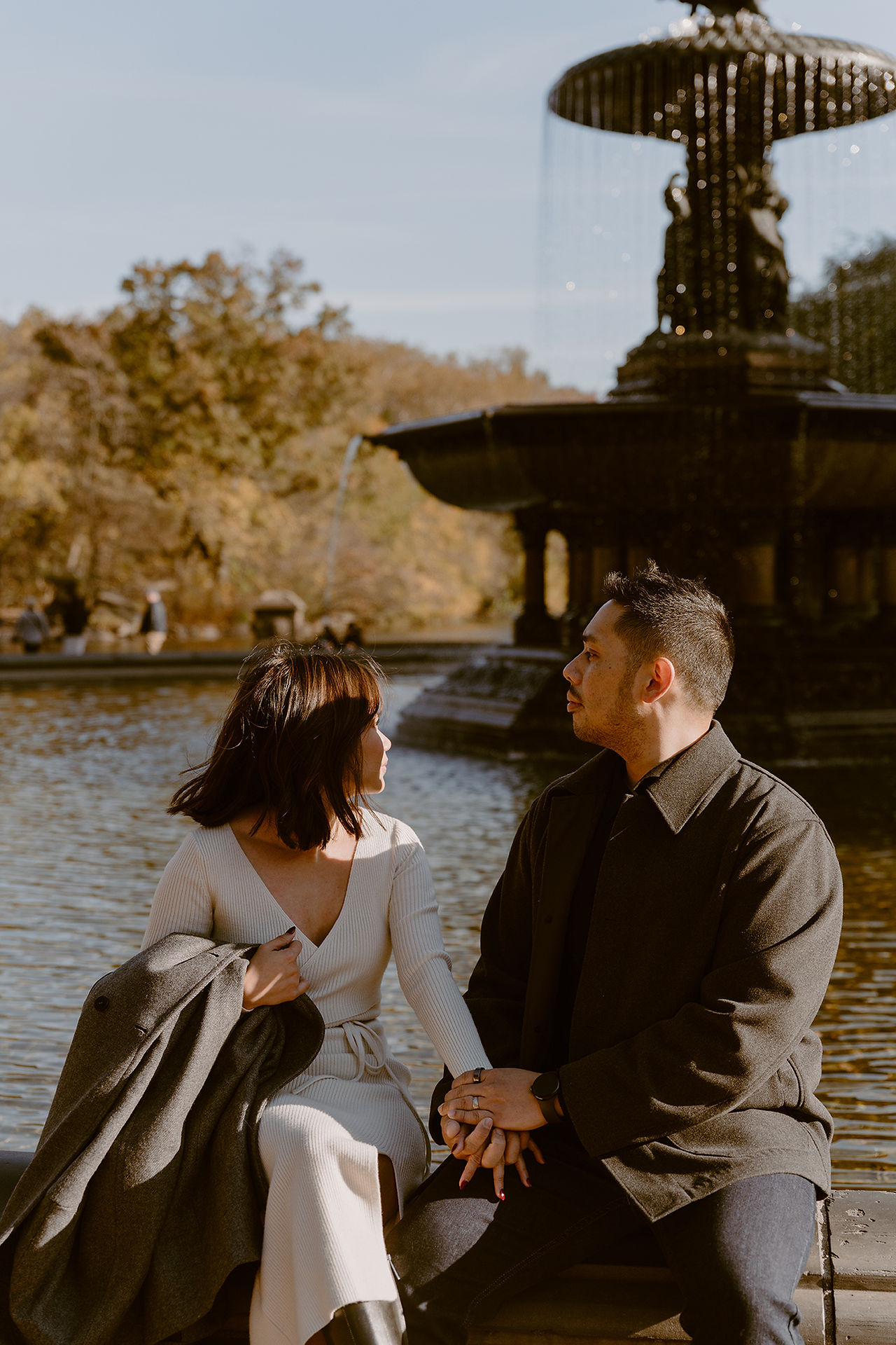 Happy couple looking at each other during an engagement photoshoot in Central Park