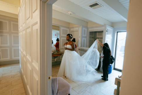Candid documentary film photographer NYC capturing bride and mother during getting ready wedding morning