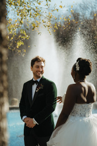 Cinematic film photographer NYC first look wedding photos couple in a garden at fall
