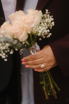 Romantic couples photography Conservatory Garden NYC winter moody ring close up during engagement photos in NYC