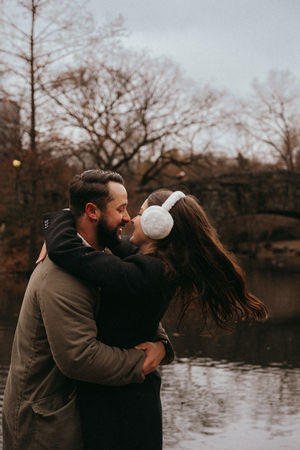 Romantic couple photoshoot near Central Parks Gapstow Bridge winter in NYC