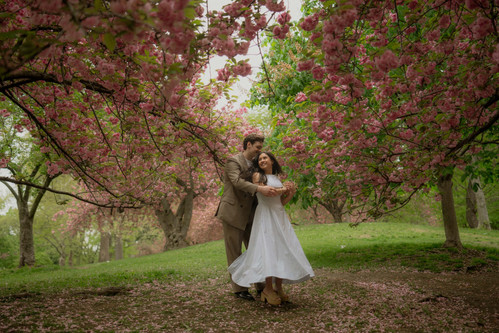 Cherry blossom engagement photos Central Park New York cinematic photography romantic engagement session
