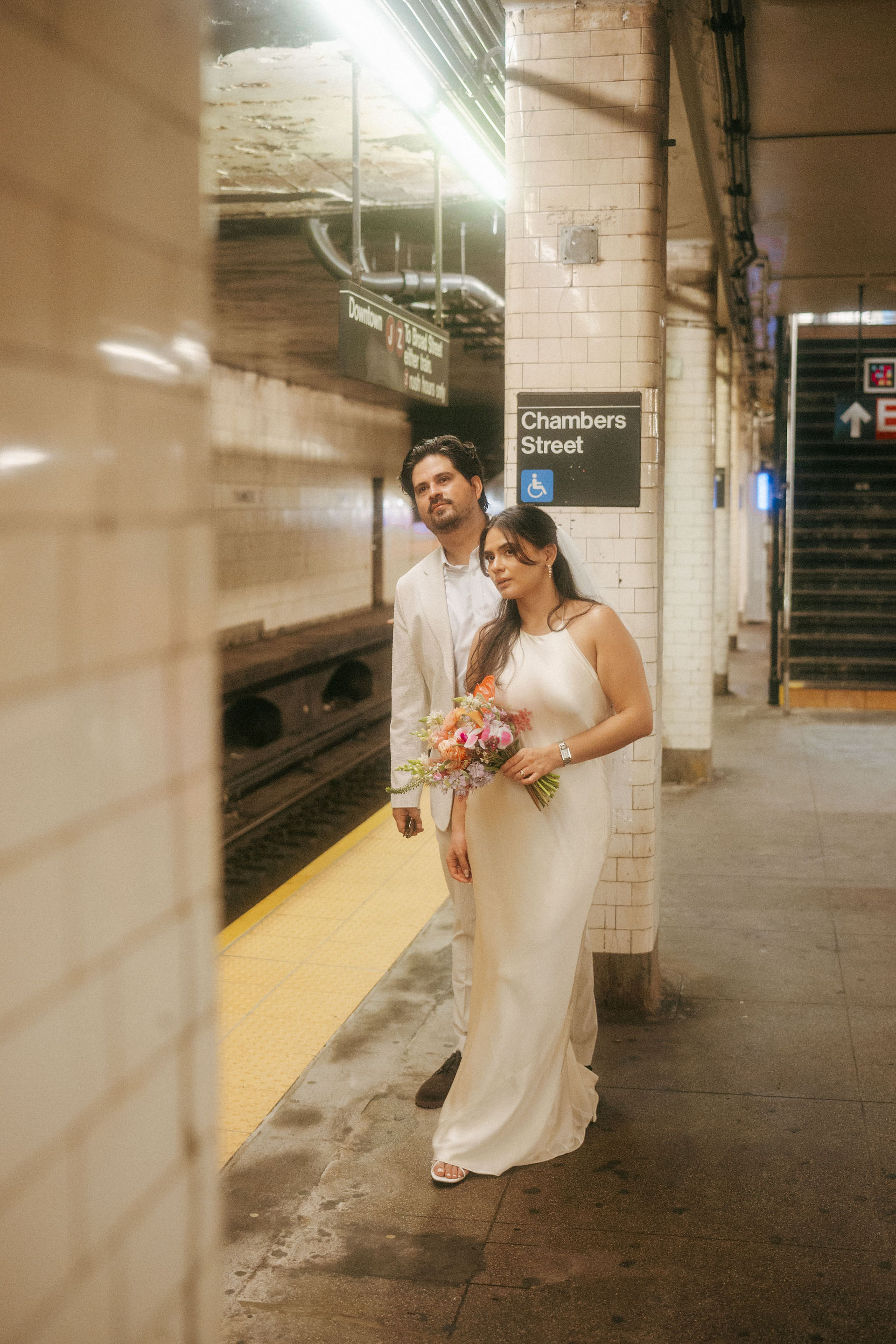 Romantic subway elopement photos after Manhattan City Hall wedding