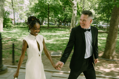 nyc elopement photos couple city hall park fountain cinematic photographer