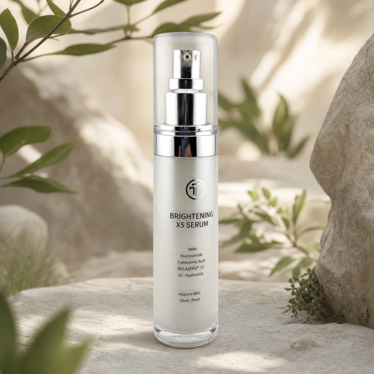 tom-tit-tot Brightening X5 Serum bottle on a stone surface