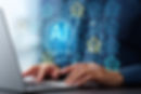 Loan officer using AI on a laptop computer.