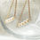 Thumbnail: Pearl Triangle Drop Earrings