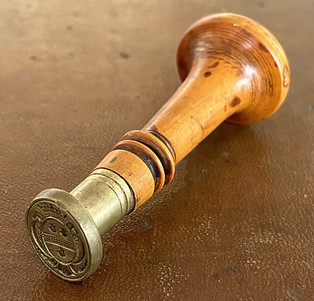 Large seal stamp in wood and brass.