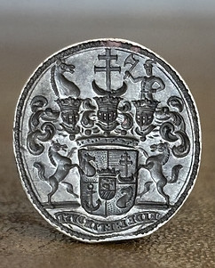 Austro-Hungarian arms on a seal stamp.