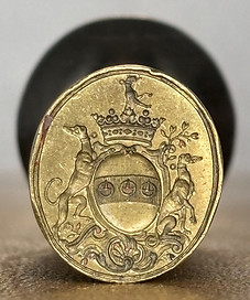 The coat of arms of the de Buissy family from France on an antique seal stamp.