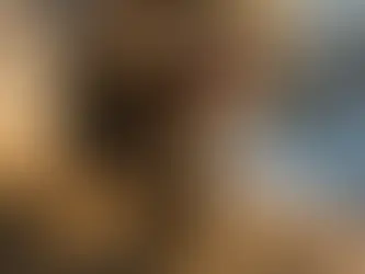 Rear view of a motorcycle with E-MARK certified 3.00-18 tires performing under extreme weight on a steep hillside trail, showcasing industrial-grade grip.