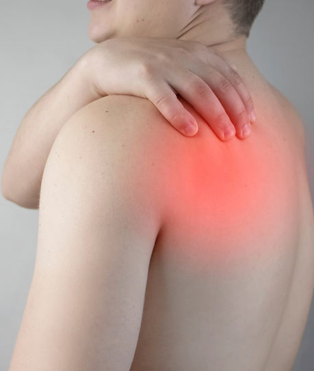 Person clutching shoulder with red highlight for shoulder pain