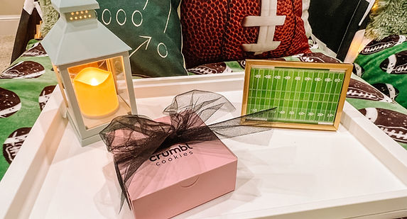 Football-themed teepee sleepover with team colors, goalpost decor, and game day vibes
