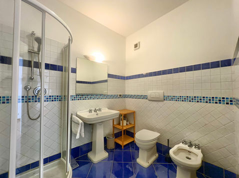 Bathroom of a flat in the former Grand Hotel Miramare, Genoa.