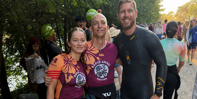 Mike R. with Coaches Robert and Rachel at the swim start of IM 70.3 Muskoka