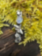 Moonstone and a silver moth and stars with white sparling stones for Halloween or the wintery seasons