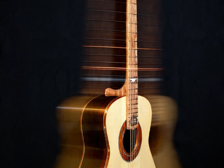 Why Your Guitar Neck is the Key to "Infinite" Sustain
