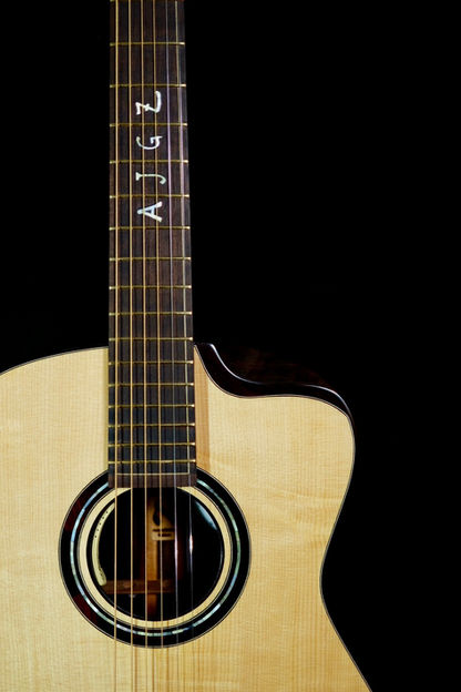 Handmade acoustic guitars, boutique guitars, luthier Singapore, guitar making classes, custom guitar building