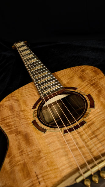 Handmade acoustic guitars, boutique guitars, luthier Singapore, guitar making classes, custom guitar building