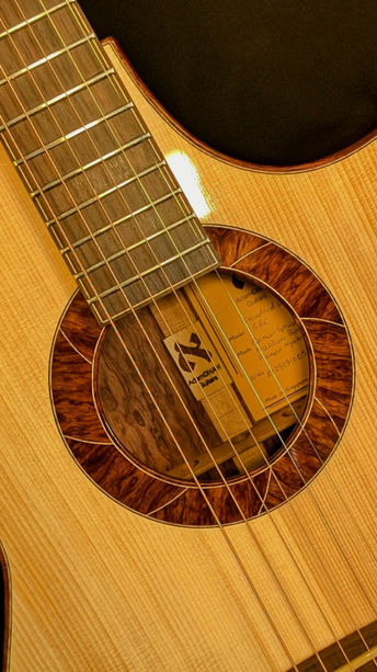Handmade acoustic guitars, boutique guitars, luthier Singapore, guitar making classes, custom guitar building