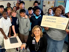 Dr. Wayne Carbiener "Above and Beyond" Award presented to Dr. Laverne Stewart, Language Arts Teacher