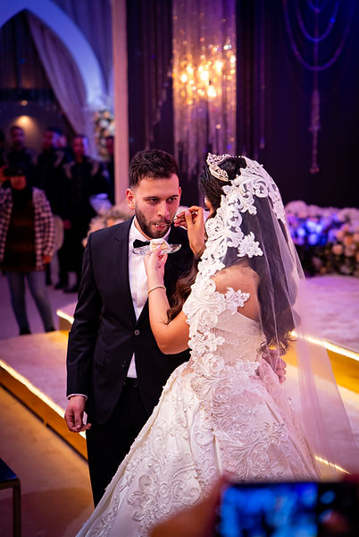 04-Salma feeding Othmane cake.jpg