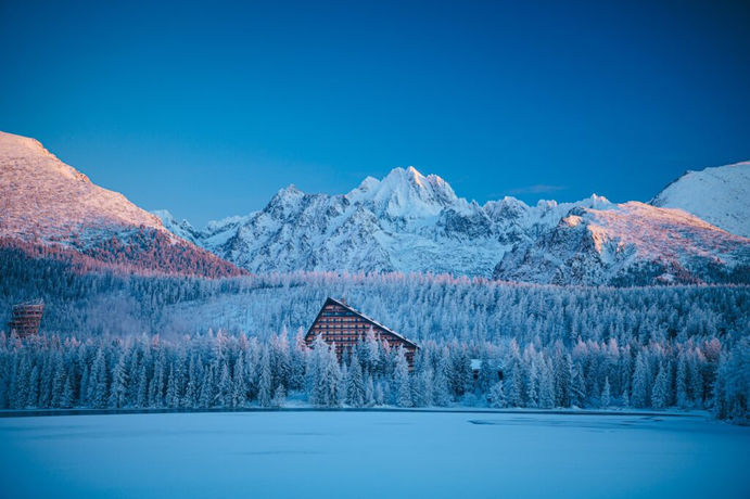 Scenic winter view of Strbske Pleso lake in Slovakia