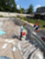 Worker prepping for pool painting in Philadelphia Bucks County
