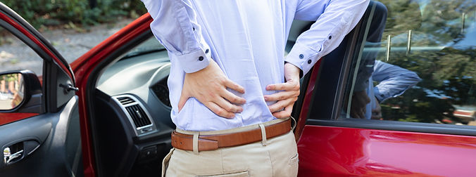 driver-having-backpain-after-driving-car_edited.jpg