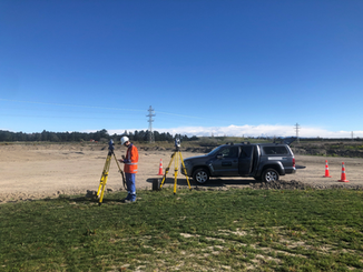 Lumen Engineer, Ethan Roylance measuring power line sag on ISL-SBK-A line on a clear day, using Lumen's reflectorless total station