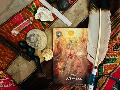 Feather with card mesa.jpeg